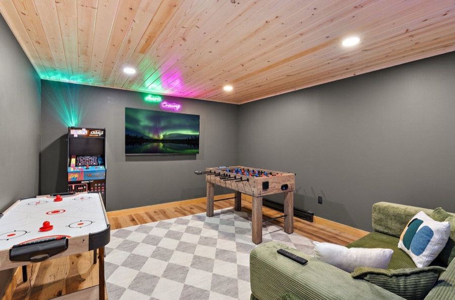 Game room with arcade, foosball and air hockey